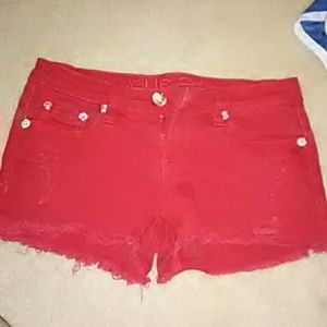 Red jean ripped shorts
